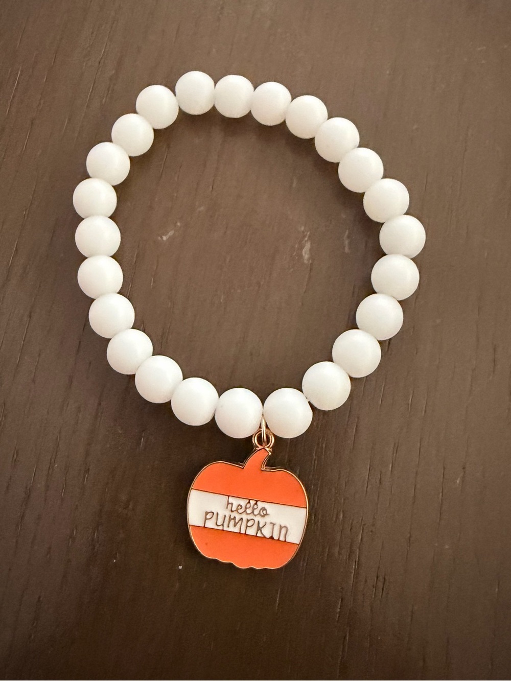 White Beaded Bracelet with Orange Pumpkin “Hello Pumpkin” Charm